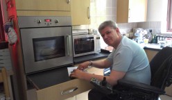 wheelchair user in kitchen